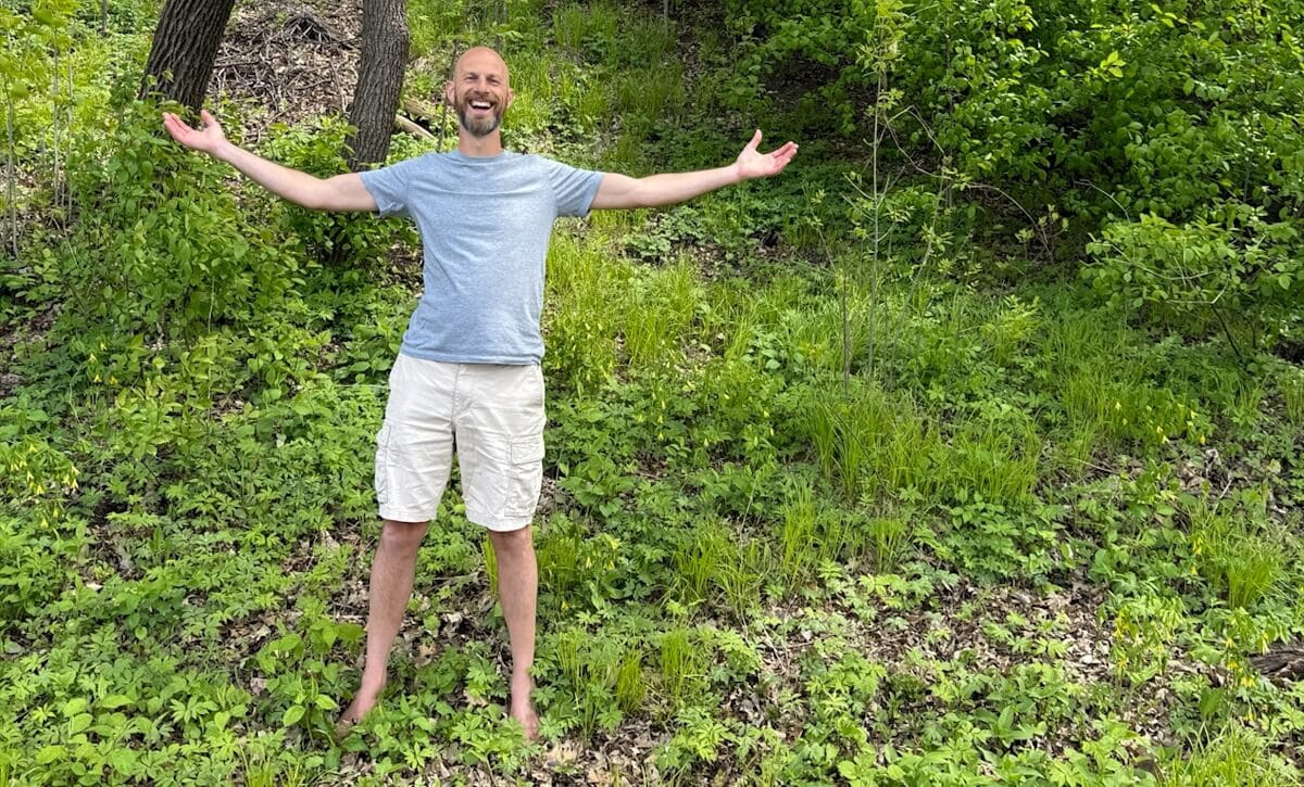 Joel Zaslofsky Joyfully Welcoming You with Trees in the Background